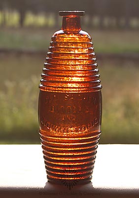 "Old Sachem / Bitters / And / Wigwam Tonic" Figural Bitters Bottle, R/H #O-46