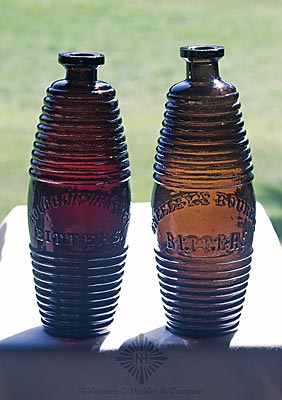 Two Figural Bitters Bottles, R/H #B-171 and #G-101