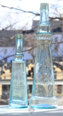 Two Skilton Foote Lighthouse Figural Bottles